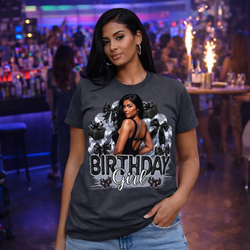 Woman wearing a 'Birthday Girl' t-shirt in a party setting