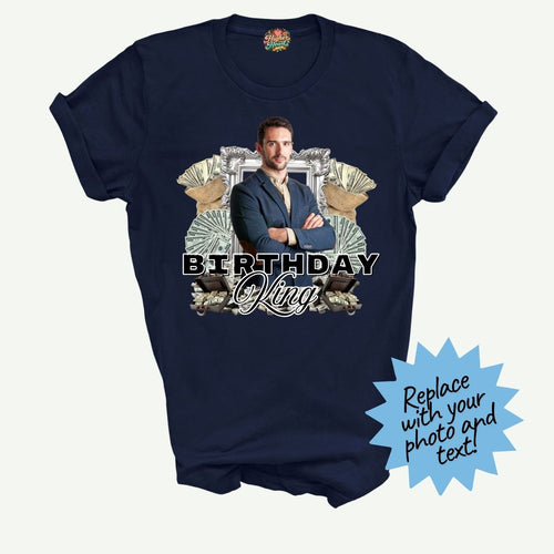 Navy blue t-shirt with a graphic design featuring a person and text 'Birthday King' on a white background.