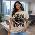Woman wearing a 'Boss Babe' t-shirt in an office setting