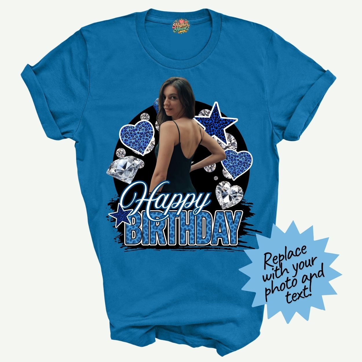 Blue t-shirt with a graphic design of a woman, stars, and hearts with 'Happy Birthday' text on a white background.