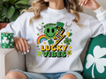 Lucky vibes St Patricks Day shirt with rainbow shamrock lightning design